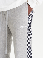 Harsh and Cruel Checkerboard Sweatpants