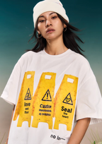 YADcrew “Love Caution Seal” Print Tee