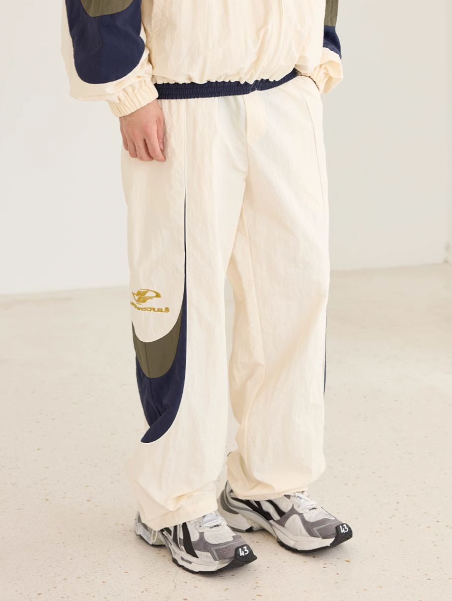 Harsh and Cruel Contrast Color Stitching Logo Track Pants