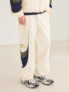 Harsh and Cruel Contrast Color Stitching Logo Track Pants
