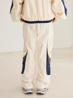 Harsh and Cruel Contrast Color Stitching Logo Track Pants