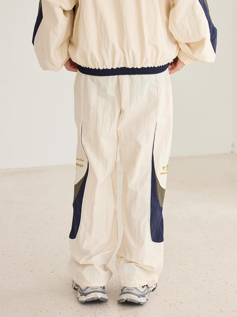 Harsh and Cruel Contrast Color Stitching Logo Track Pants