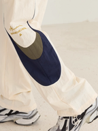 Harsh and Cruel Contrast Color Stitching Logo Track Pants
