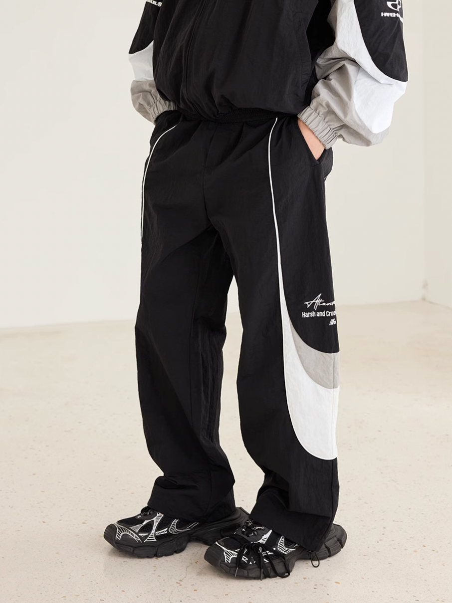 Harsh and Cruel Contrast Color Stitching Logo Track Pants