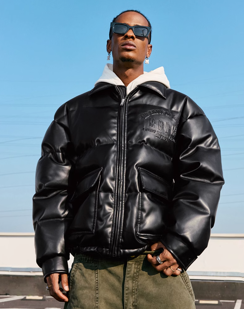 MEDM Embossed LOGO Leather Down Jacket