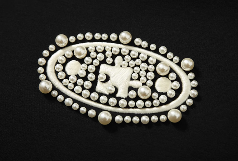 YADcrew Pearl and Embroidered Logo Puzzle Hoodie
