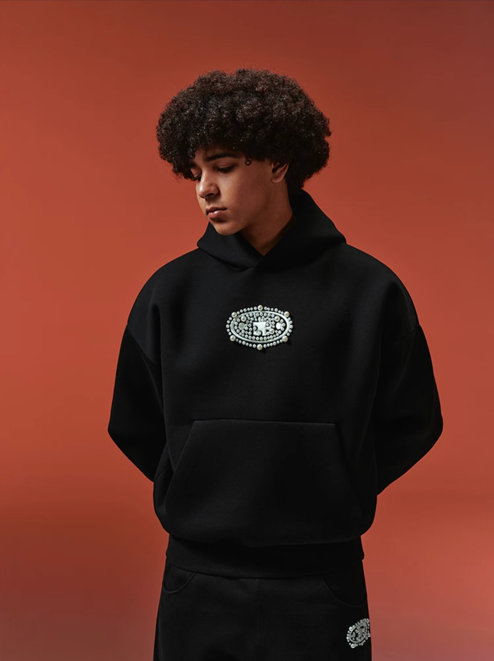 YADcrew Pearl and Embroidered Logo Puzzle Hoodie