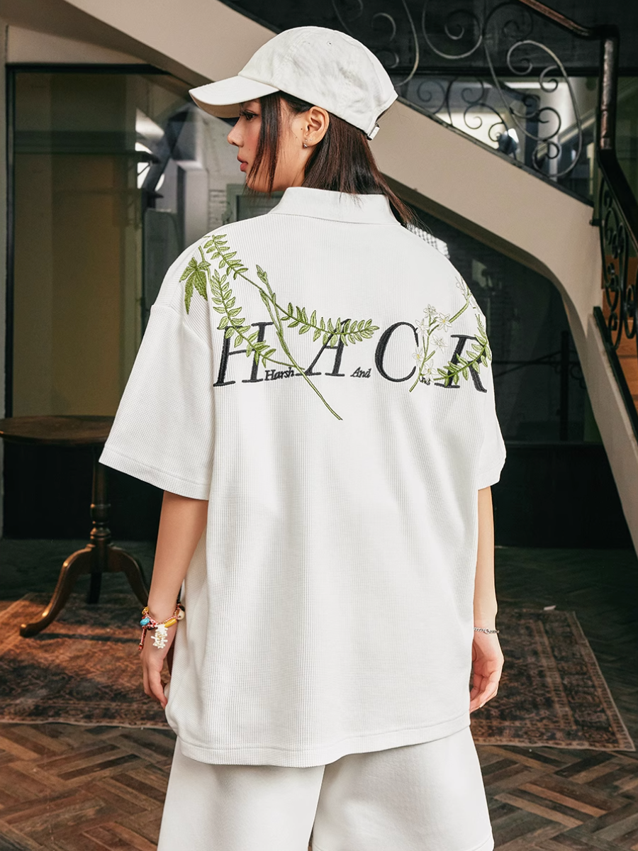 Harsh and Cruel Botanical Embroidered Polo
