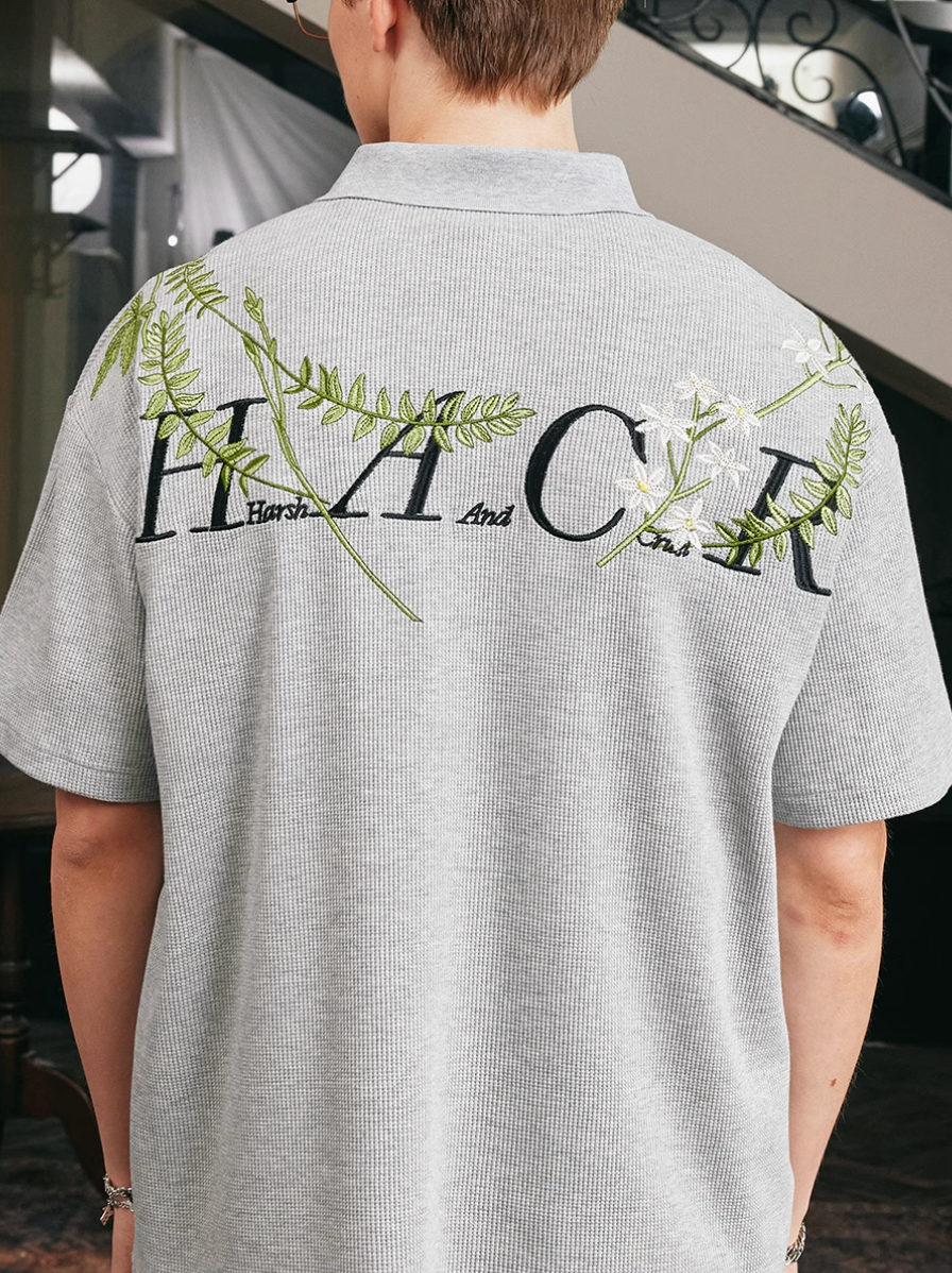 Harsh and Cruel Botanical Embroidered Polo