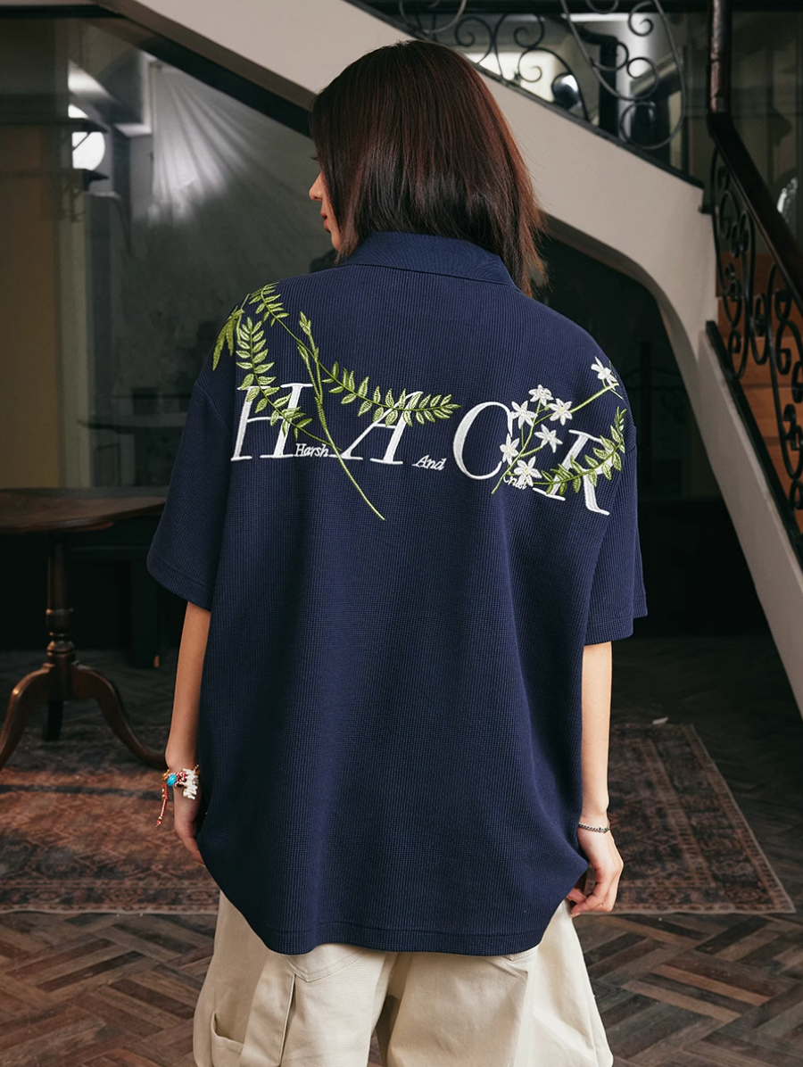 Harsh and Cruel Botanical Embroidered Polo