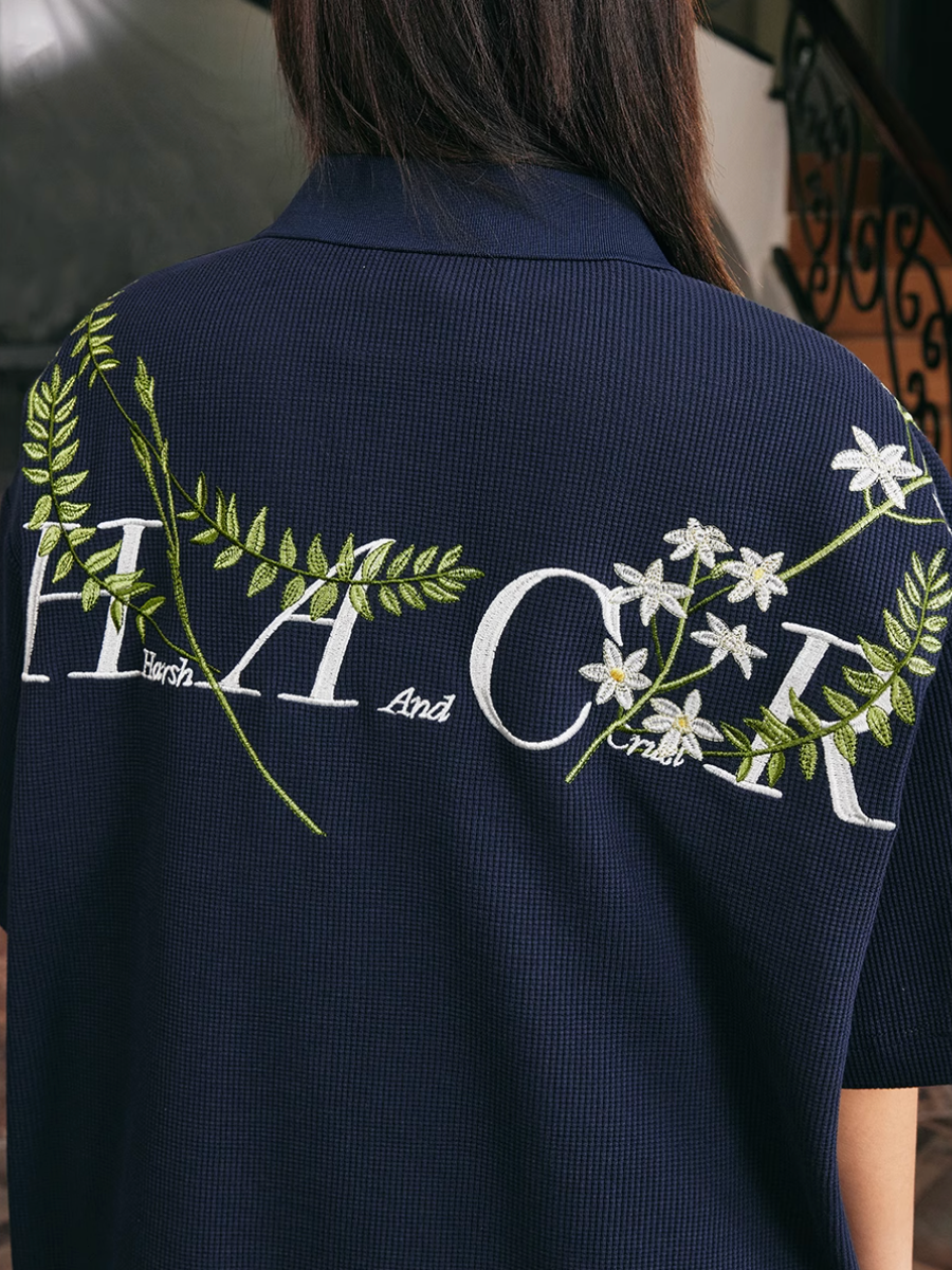 Harsh and Cruel Botanical Embroidered Polo