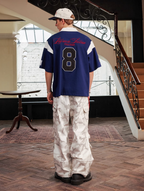 Harsh and Cruel Colorblock Number Embroidered Polo
