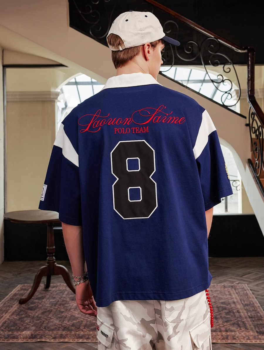 Harsh and Cruel Colorblock Number Embroidered Polo