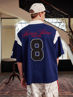 Harsh and Cruel Colorblock Number Embroidered Polo