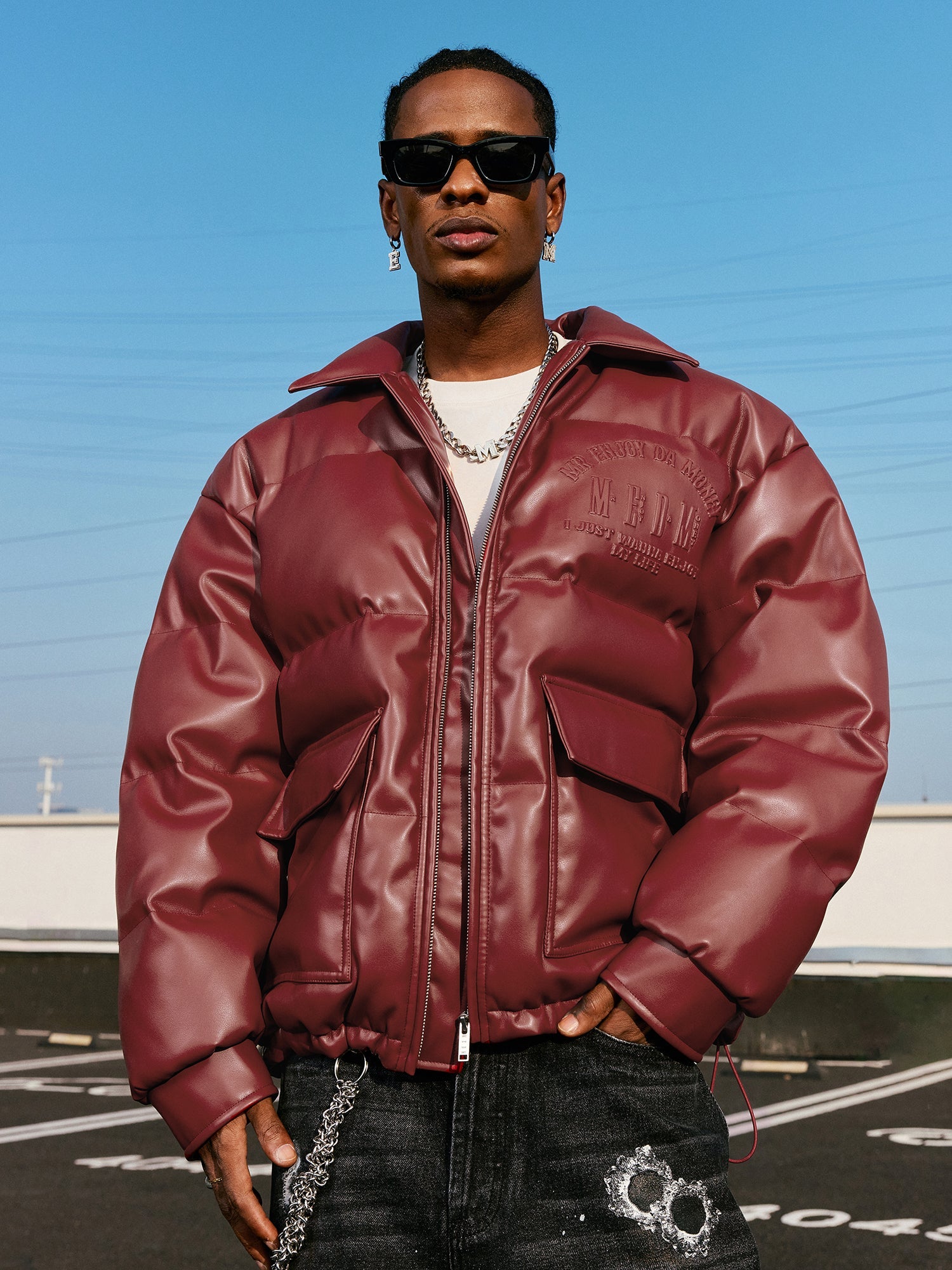 MEDM Embossed LOGO Leather Down Jacket