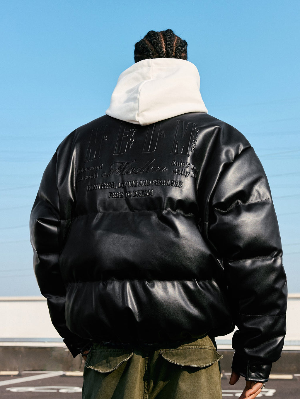 MEDM Embossed LOGO Leather Down Jacket