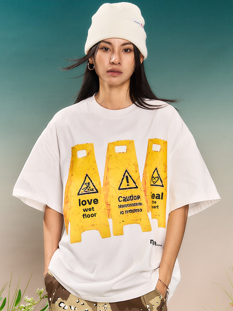 YADcrew “Love Caution Seal” Print Tee