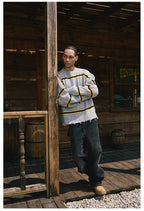 Remedy Striped Distressed Knit Sweater