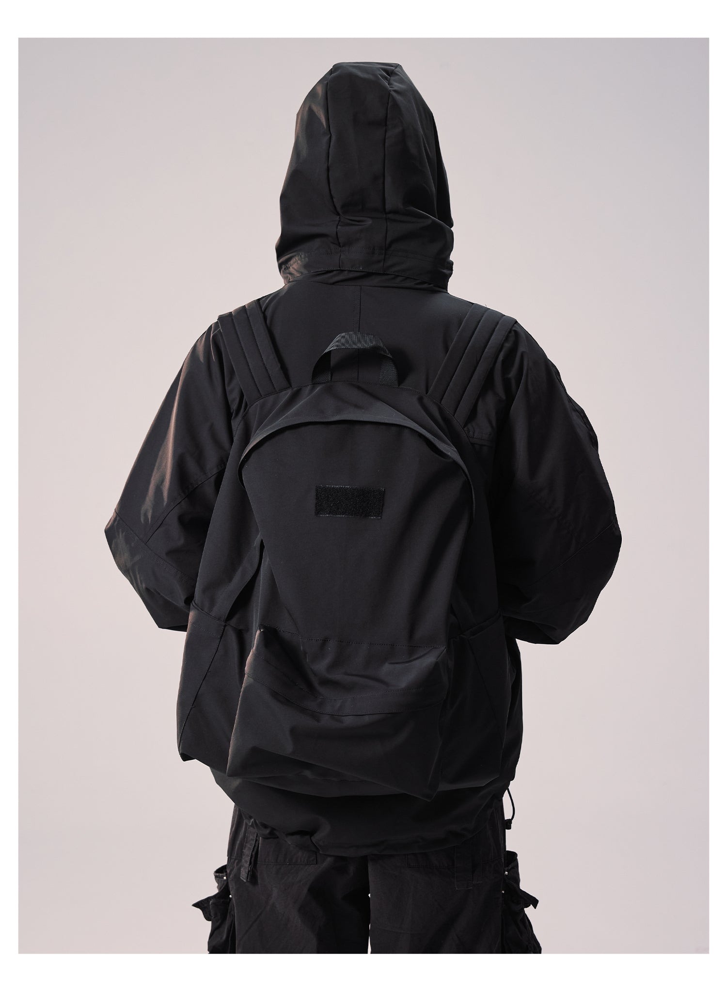 Remedy Backpack Design Hooded Windbreaker Jacket