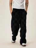 EVILKNIGHT(EK) Jacquard Logo Plaid Knit Pants