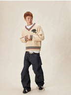 EVILKNIGHT(EK) Logo Cable Knit V Neck Sweater