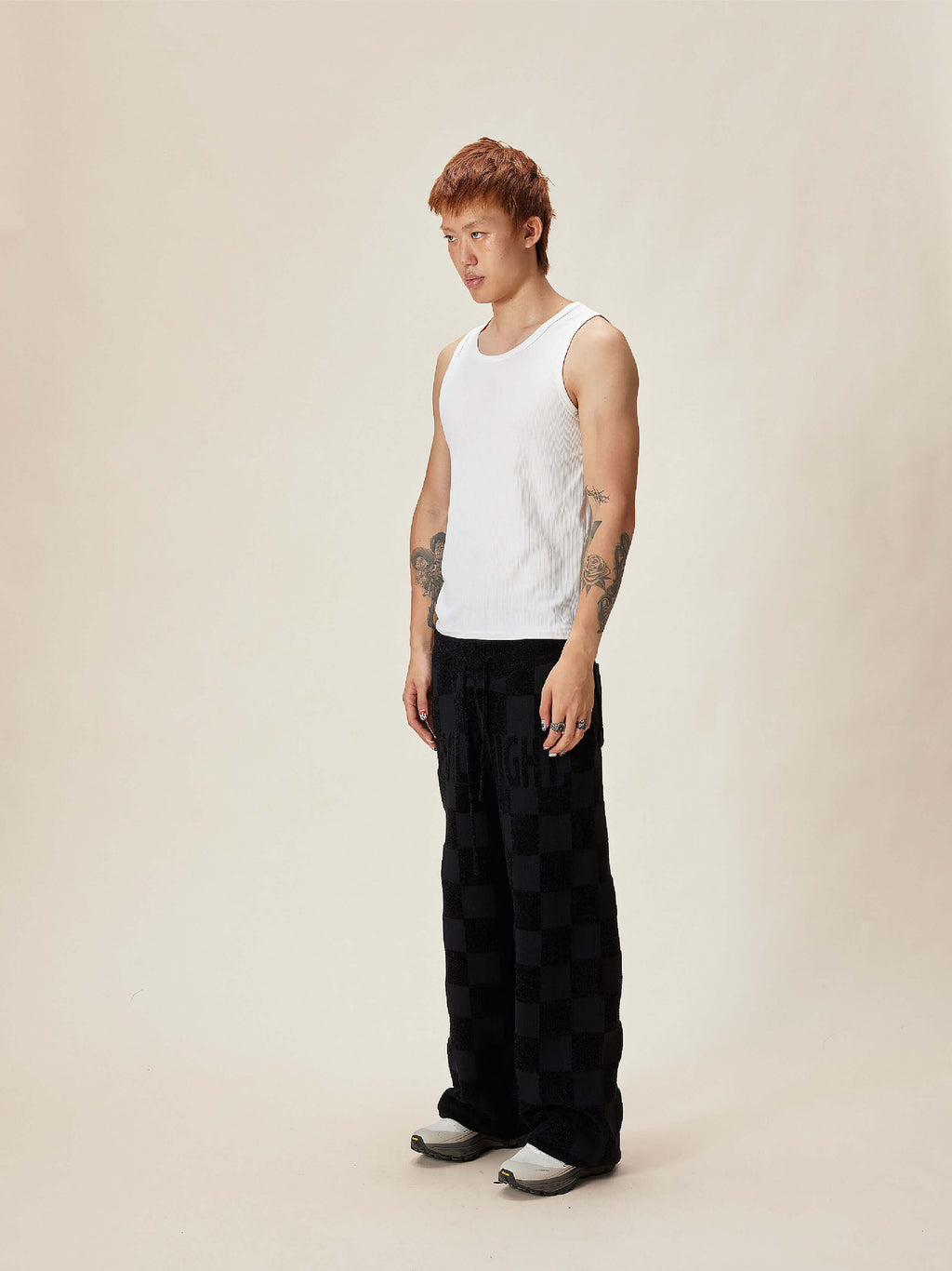 EVILKNIGHT(EK) Jacquard Logo Plaid Knit Pants