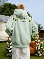 Harsh and Cruel Floral Garland Embroidered Text HACR Hoodie