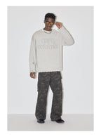 EMPTY REFERENCE Gray Hole Logo Knit Sweater