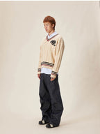 EVILKNIGHT(EK) Logo Cable Knit V Neck Sweater
