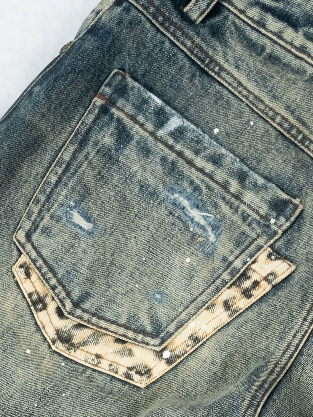 ANTIDOTE Distressed Leopard Patchwork Washed Jeans
