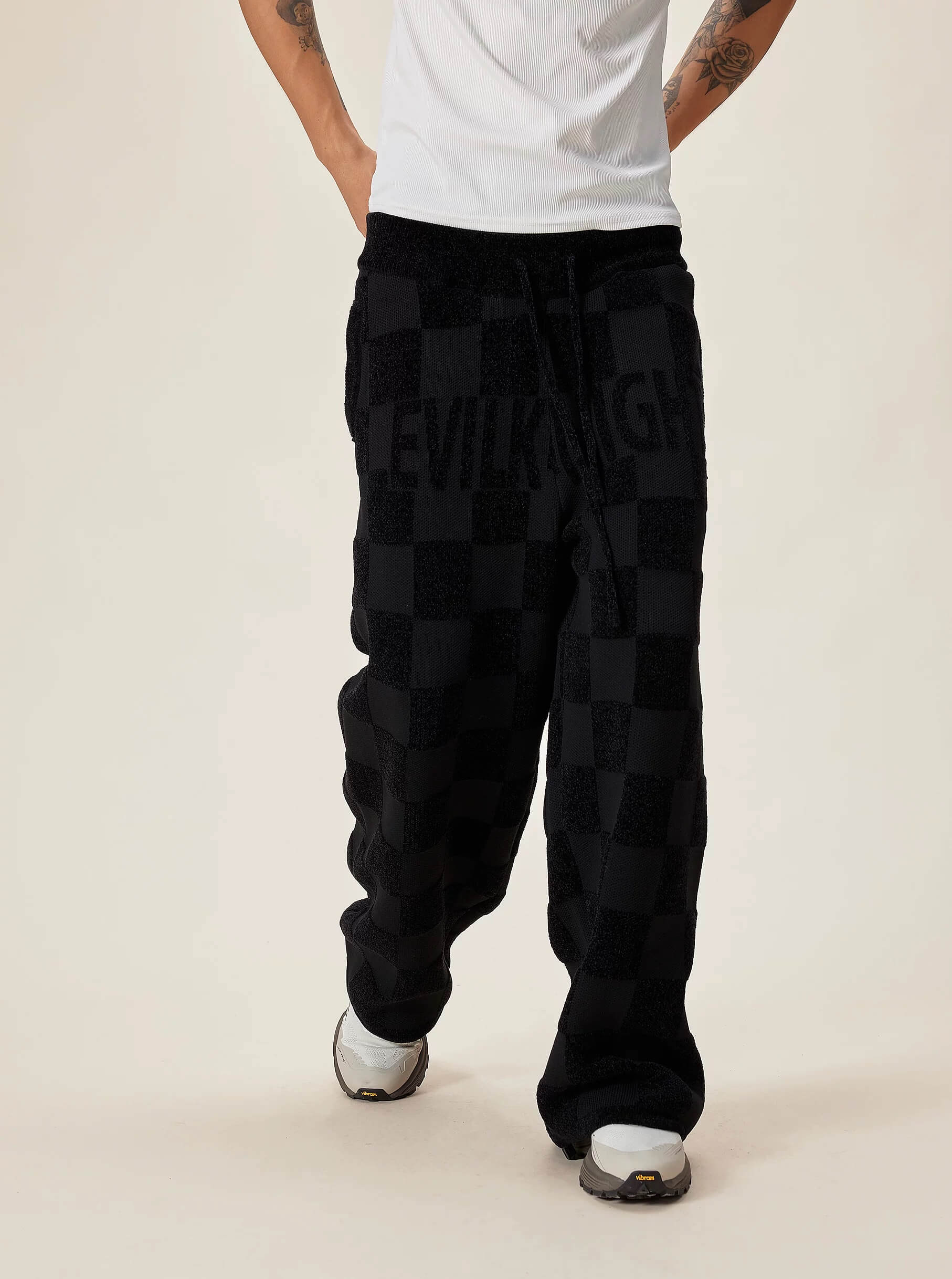EVILKNIGHT(EK) Jacquard Logo Plaid Knit Pants