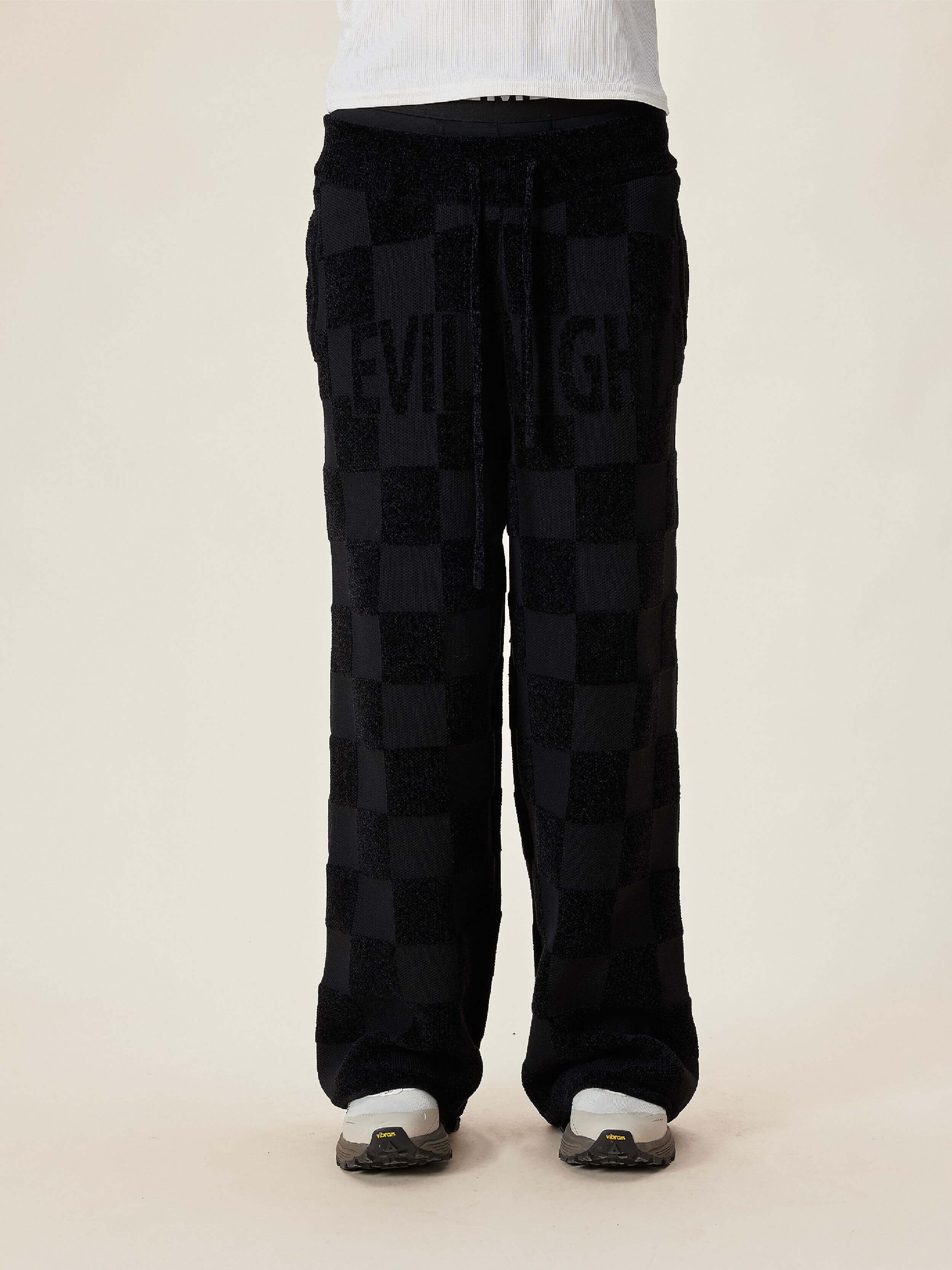 EVILKNIGHT(EK) Jacquard Logo Plaid Knit Pants