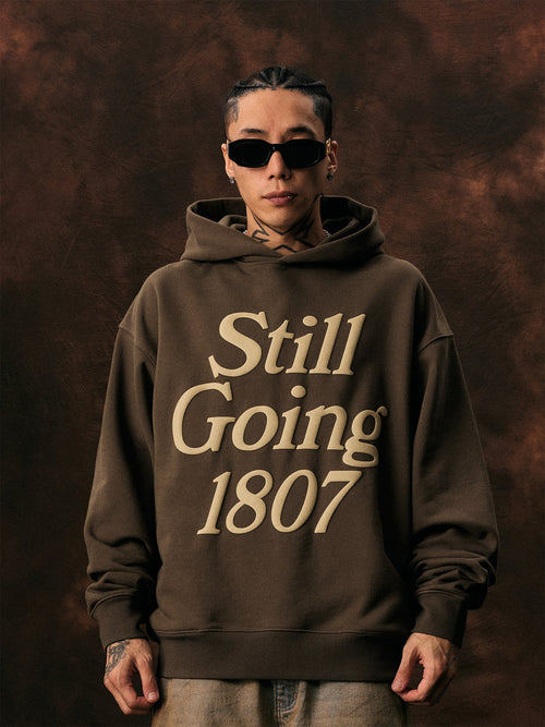 1807 STILL GOING Foam Print Hoodie